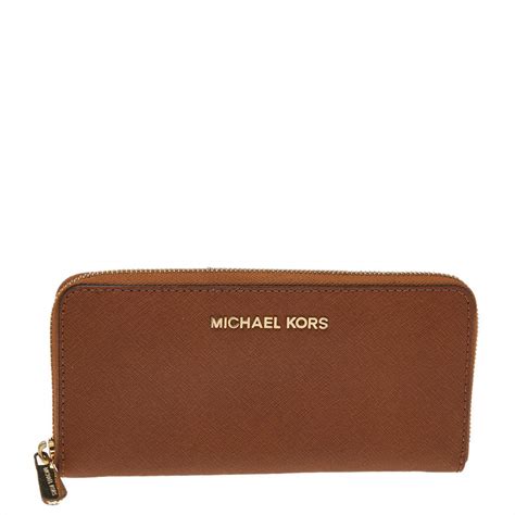 michael kors travel wallet tan|Michael Kors zippered wallet.